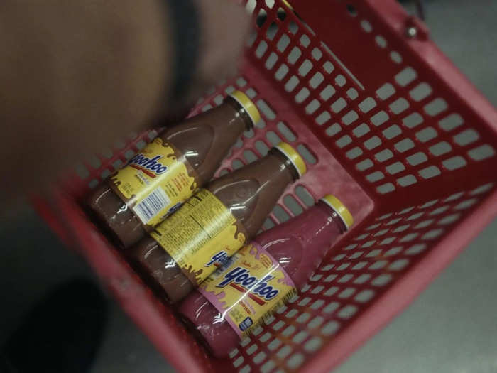 Jeevan buys strawberry Yoo-hoo at the grocery store, minutes after his sister Siya recounted a story about it from their childhood.