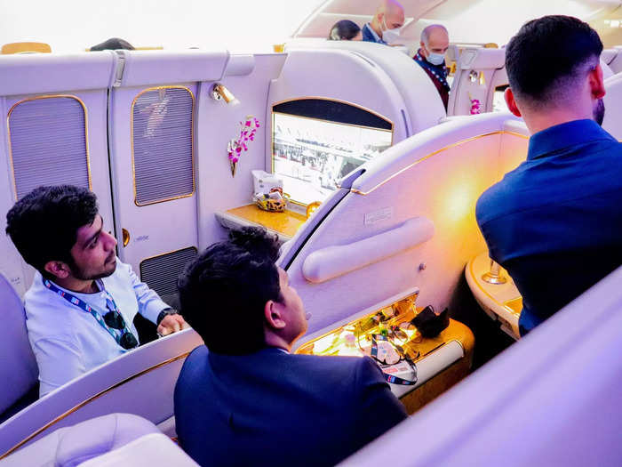 A steady stream of airshow visitors filed through the aircraft, taking selfies in the business class seats and first class suites while marveling at the bar and showers.