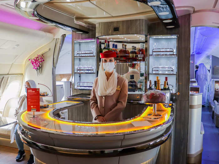 Even the in-flight bar has been enhanced with new seating options and the same color palette found in business class.