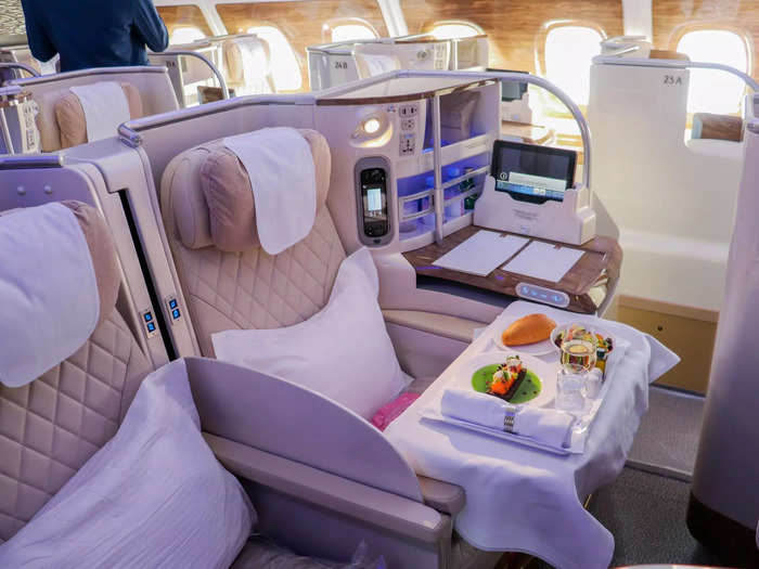 In business class, the 76 seats will be reupholstered and redesigned with a new champagne-color leather and wood finishing.