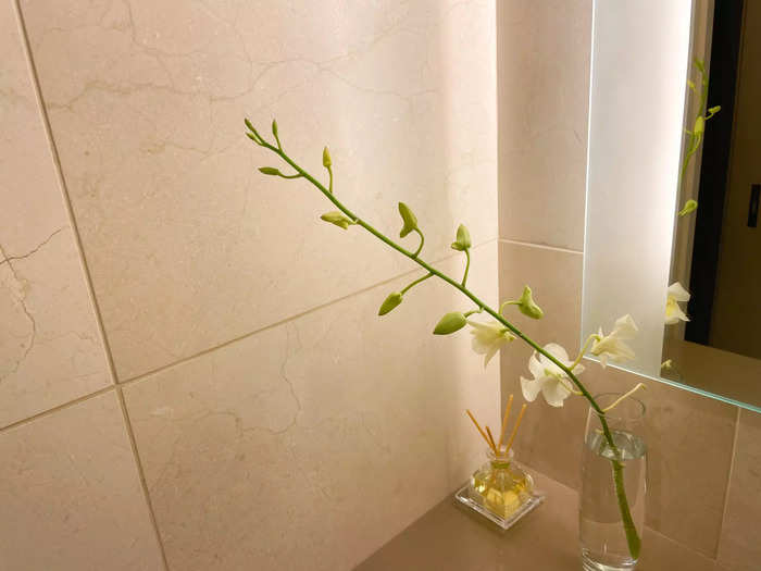 Instead of fake, plastic plants, my room had a fresh orchid cutting in the bathroom and a succulent near the fireplace.