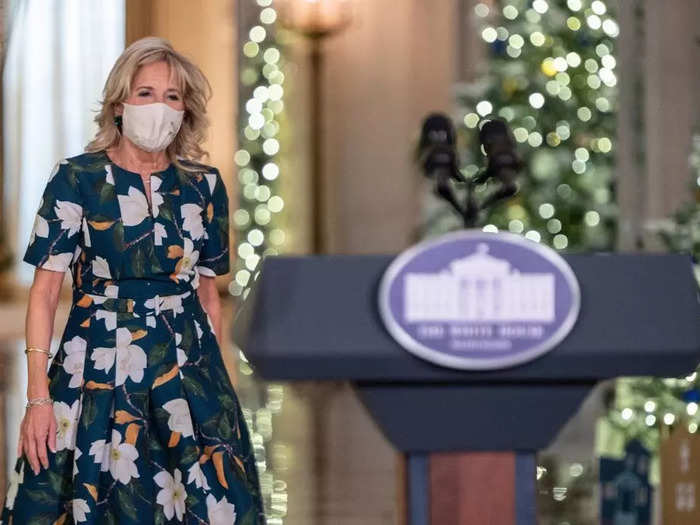 She wore a green floral dress to a reception thanking the volunteers who helped decorate the White House for Christmas.