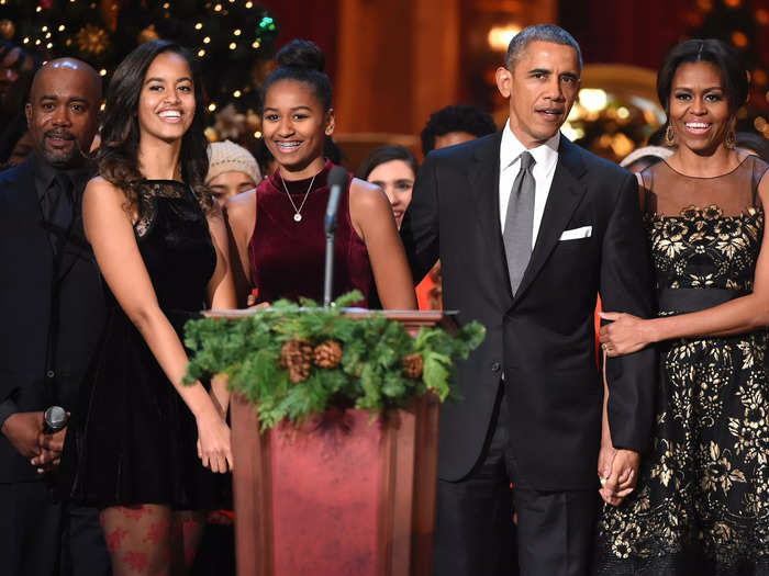 She wore another sleeveless dress in 2014, this time in black and gold.