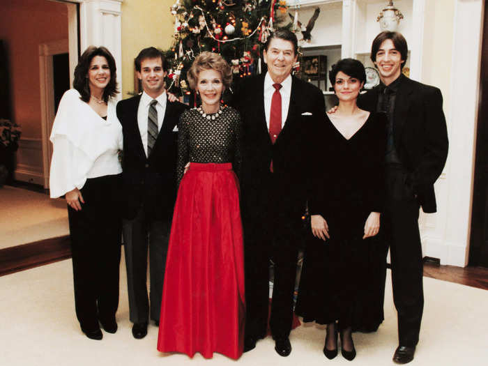 First lady Nancy Reagan was known for wearing her signature red year-round but especially during the holidays.