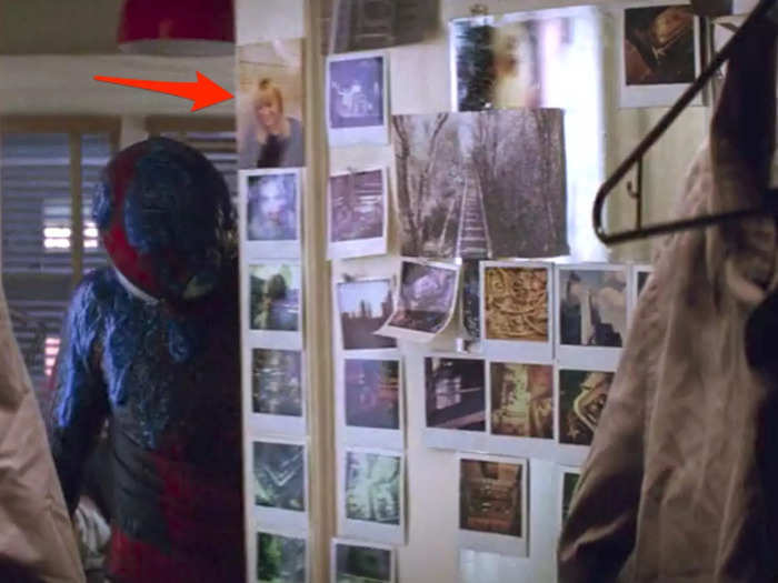 Peter has a photo of Gwen in his closet door, along with some Polaroids.