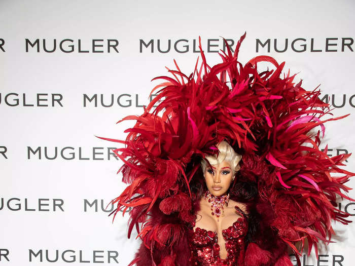 For her first red-carpet appearance since giving birth to her son, Cardi B made an entrance in feathers and sequins at the "Thierry Mugler: Couturissime" exhibition during Paris Fashion Week in September.