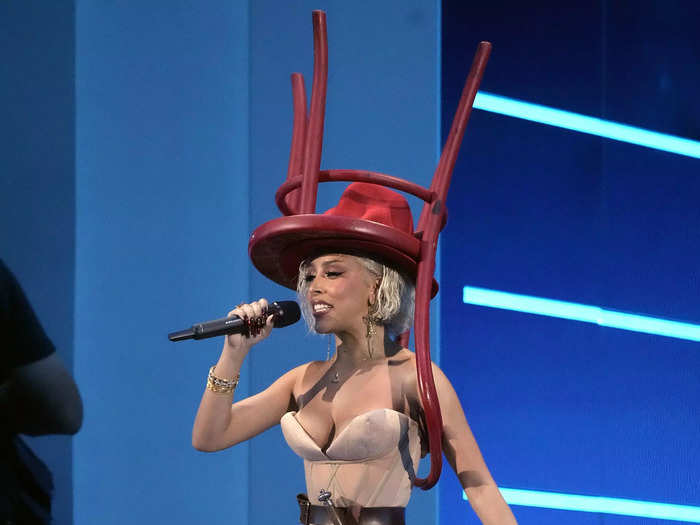 Doja Cat wore multiple looks to host the MTV Video Music Awards in September, including a horse-themed outfit complete with a hat shaped like a chair.