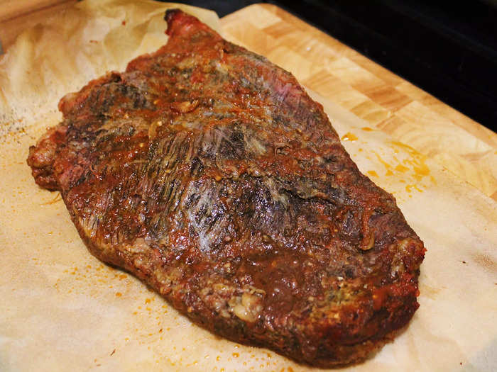 I removed the brisket from the roasting pan and set it aside.