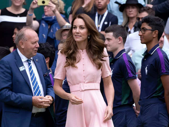 To attend the Wimbledon tennis championships, the duchess wore a pale pink dress with button detailing.