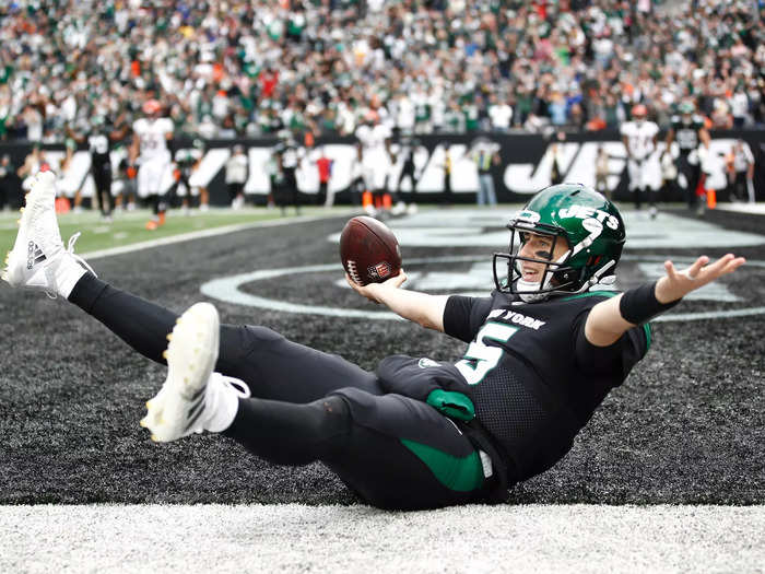 October 31: New York Jets quarterback Mike White celebrates after catching the ball for a two point conversion during the fourth quarter against the Cincinnati Bengals.