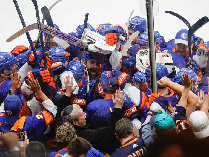 June 23: The New York Islanders celebrate after their 3-2 overtime victory against the Tampa Bay Lightning in Game Six of the 2021 Stanley Cup Semifinals.