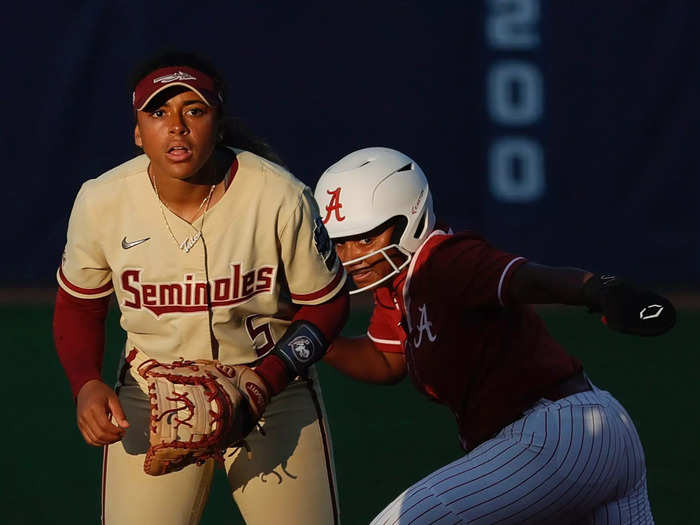 June 7: Elissa Brown of the Alabama Crimson Tide (right) runs to second as Florida State Seminoles infielder Elizabeth Mason defends during the fifth inning of the Women