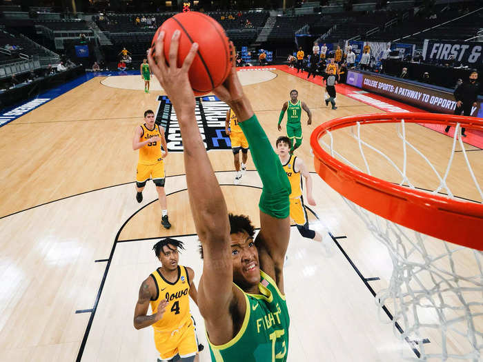 March 22: Chandler Lawson of the Oregon Ducks dunks against the Iowa Hawkeyes in the second round game of the 2021 NCAA Men