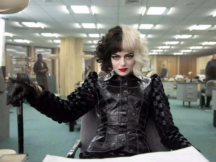 Emma Stone wore black and white wigs and heavy makeup to play Cruella De Vil in Disney