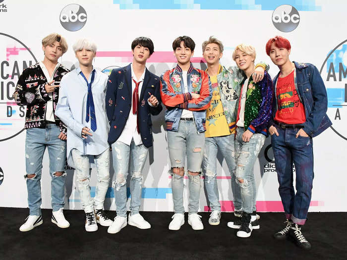 BTS wore a casual look at the 2017 American Music Awards which included ripped jeans, blazers, and jean jackets.