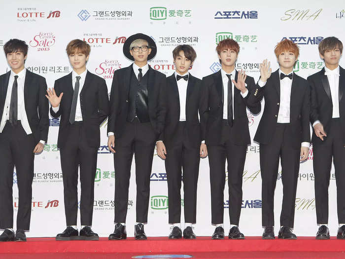 BTS donned coordinated black suits for the 24th Seoul Music Awards in 2015.