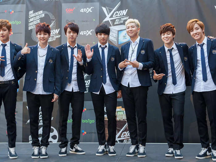 BTS visited KCON in preppy blazers and slacks in August 2014.