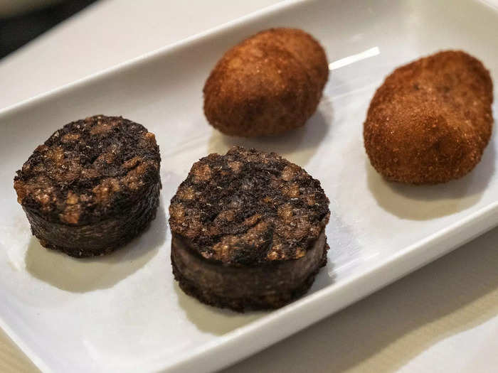 We started our meal with a small portion of croquettes and black sausage.