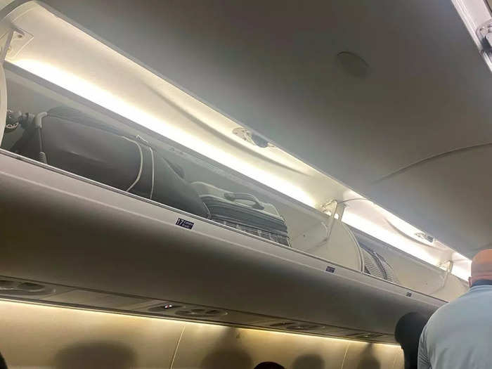 Meanwhile, the overhead bins were spacious and easily fit my carry-on bag. It is important to note that while the regional jet can store standard carry-ons, they are smaller than bigger narrow bodies and may not fit a large suitcase or duffle, so plan accordingly.