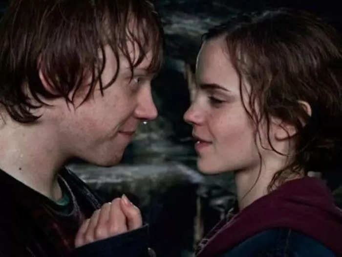 Ron and Hermione finally sharing a kiss after eight movies of anticipation in "Harry Potter and the Deathly Hallows Part 2"