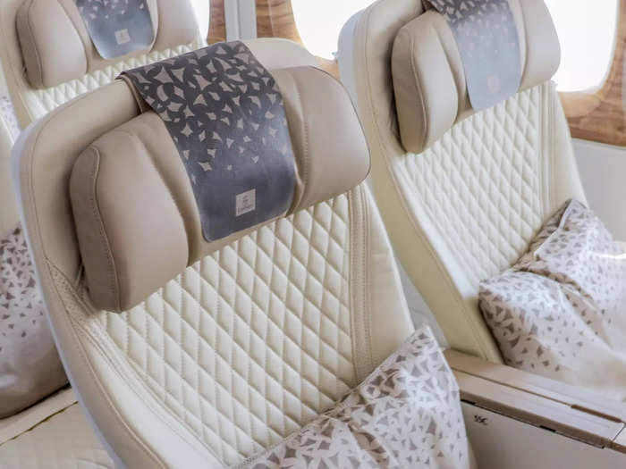 Each seat also comes standard with a six-way adjustable headrest and an oversize pillow, and flight attendants distribute blanket kits on long-haul flights.