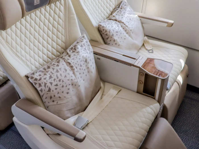 Premium economy seats offer a deeper recline than economy class seats, with footrests and calf rests available for additional comfort.