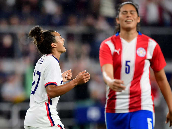 9/21: Sophia Smith (left) of the USWNT celebrates her first career international goal as Paraguay