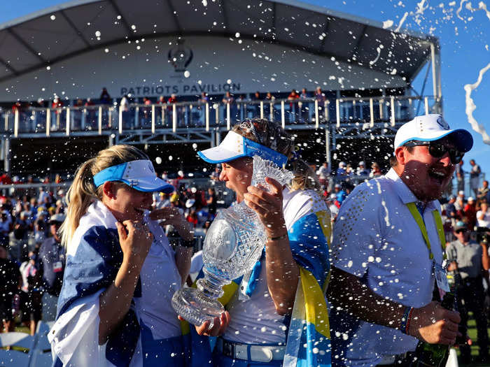 9/6: Team Europe stars Matilda Castren and Madelene Sagstrom celebrate with the Solheim Cup after beating Team USA in the event.