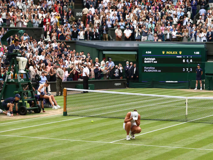 7/10: Ashleigh Barty celebrates defeating Karolina Pliskova to win the 2021 Wimbledon women