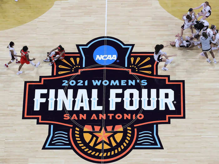 4/4: A dejected Aari McDonald (left) sits on the court after missing a last second shot that allowed the Stanford Cardinal to win in the 2021 national championship over the Arizona Wildcats.