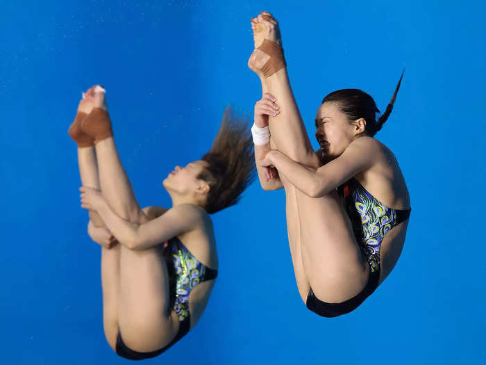 1/22: Wang Han and Shi Tingmao of China practice in the Women