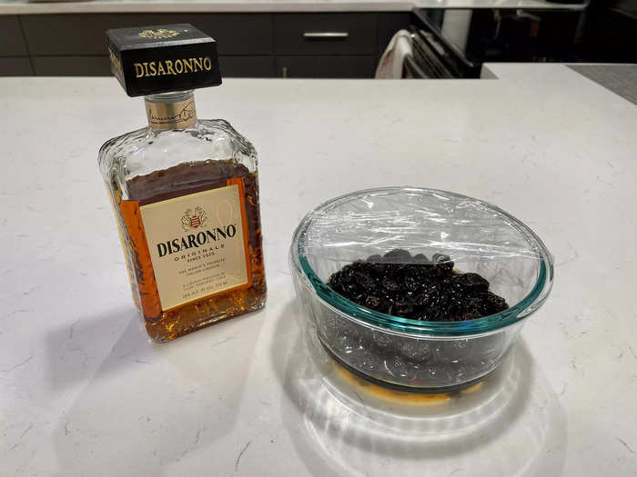 First, soak a bowl of raisins in Amaretto for six to eight hours or overnight.