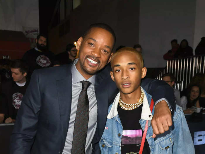 Though they rocked different hair colors and opposite fashion styles, Will Smith and Jaden Smith still mirrored each other on a December 2017 red carpet.