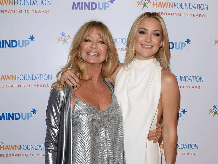 Goldie Hawn and Kate Hudson looked more like sisters than mother and daughter at a 2014 event. The latter star wore a white gown, while Hawn chose a three-piece silver ensemble.