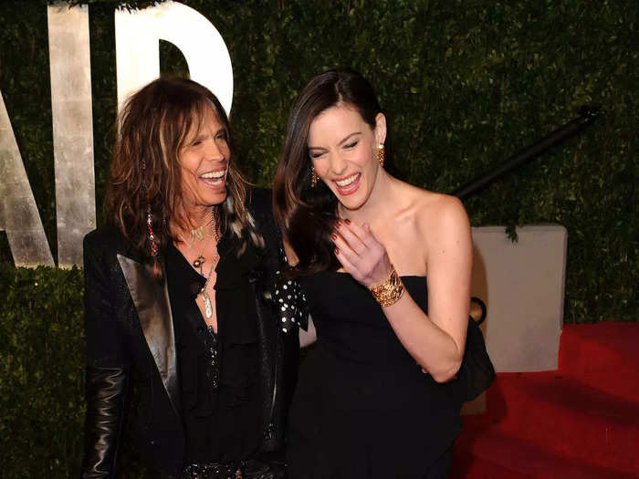 Steven Tyler and his daughter Liv Tyler share both a strong resemblance and an edgy style, as seen on a red carpet in February 2011.