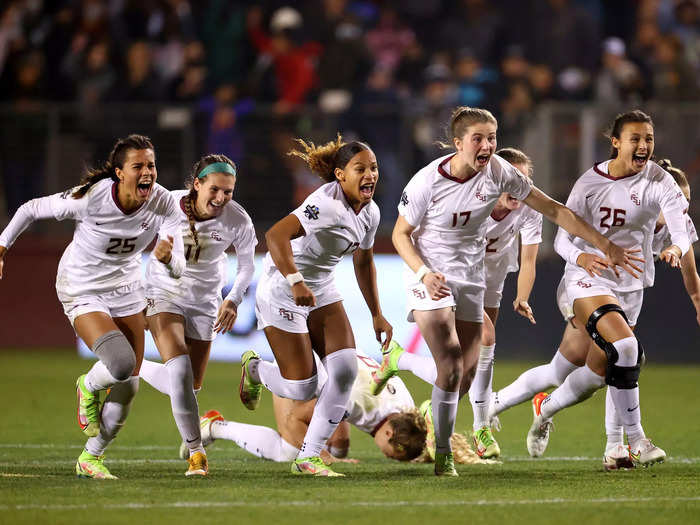 12/6: Florida State players celebrate beating BYU in penalty kicks to win the Division I national championship.