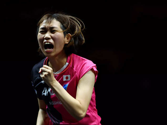 12/4: Japanese table tennis player Hitomi Sato celebrates winning a point against Austria