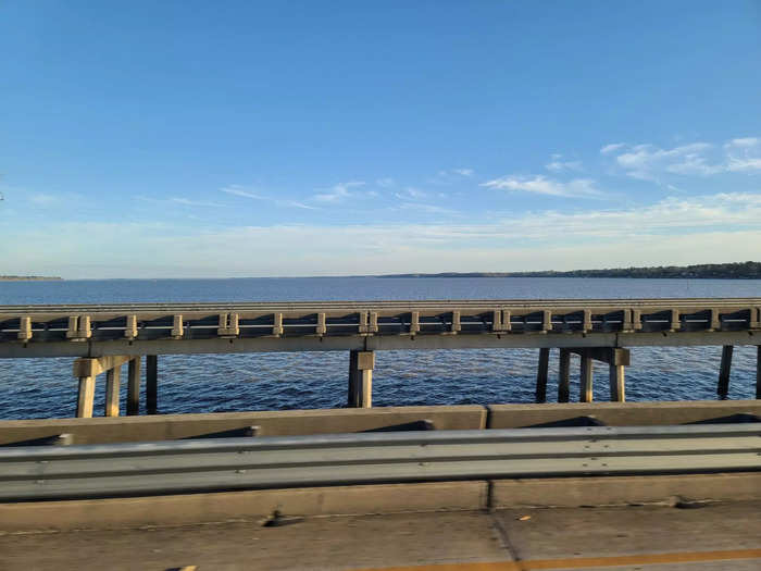 With the sun drifting toward the horizon, he crossed the Francis Marion Bridge over the placid waters of Lake Marion in South Carolina...