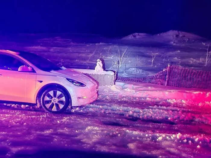 Next, he stepped outside to check on the scene and talk with other drivers – one of whom had made a snowman – then he made dinner in his truck.