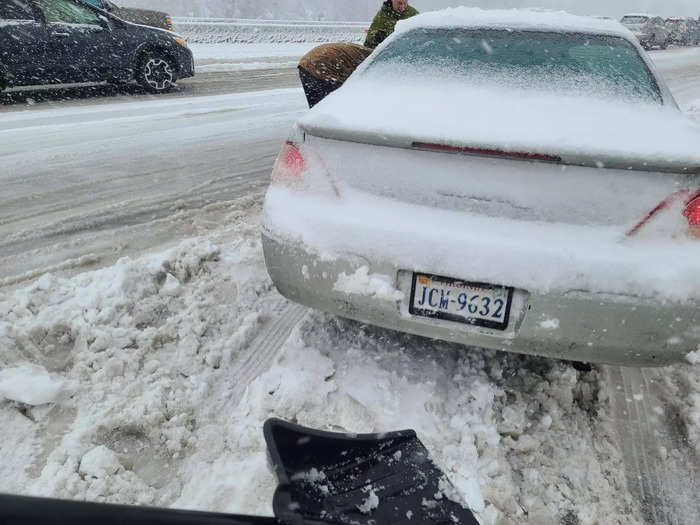 Traffic began to slow considerably, and he stopped several times to help stuck cars get back on their way.