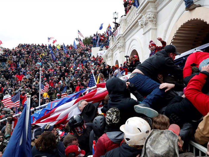 Pro-Trump protesters storm into the U.S. Capitol during clashes with police, during a rally to contest the certification of the 2020 U.S. presidential election results by the U.S. Congress, in Washington, U.S, January 6, 2021.