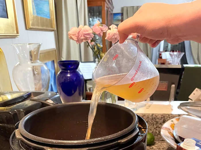 Then add water and either the chicken broth or chicken bouillon cubes.