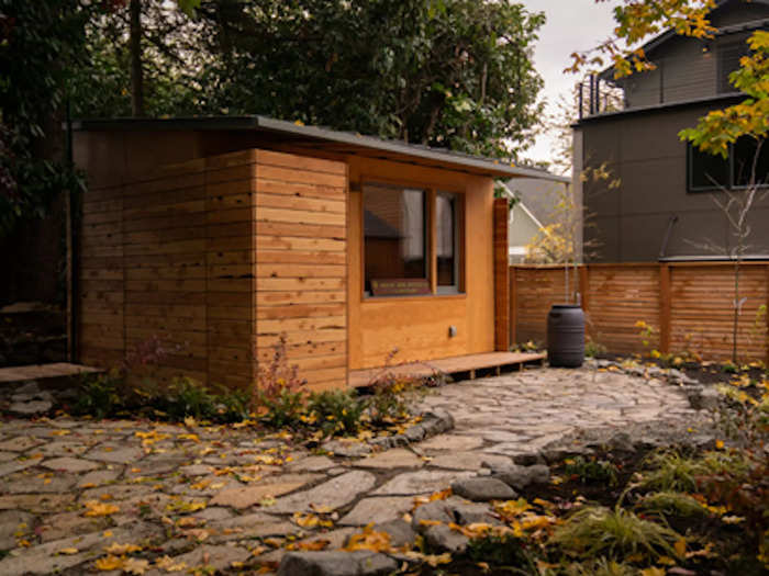 This space is then used for the 128-square-foot tiny home, a pathway leading up to the home, and landscaping.