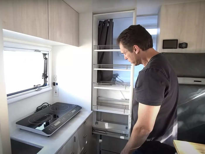 … a sink, a countertop, and plenty of storage, like the pull-out pantry.