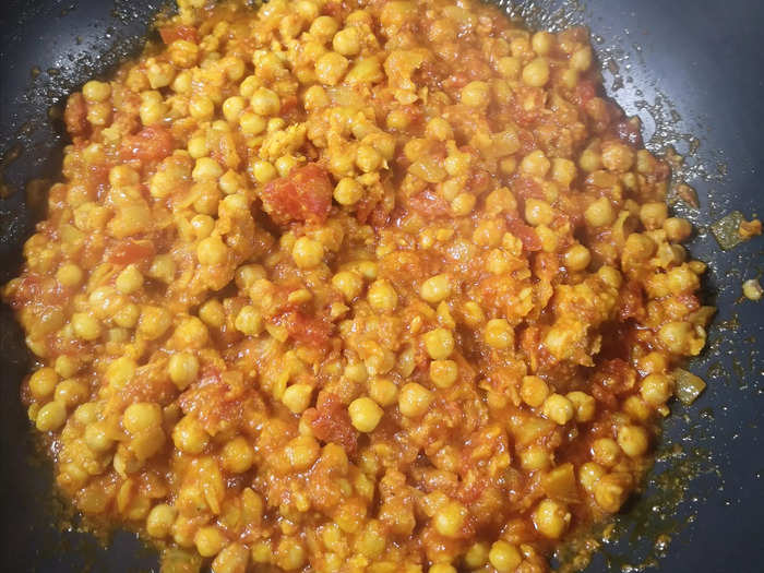 The curry should be in its final stages now. Leave it on medium heat until it looks cohesive and slightly thicker.