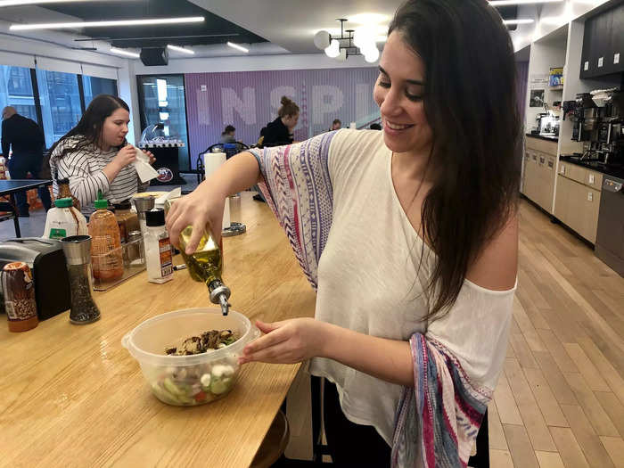 After all the main ingredients are in, I add a few twists of salt and a lot of black pepper before drizzling everything with olive oil and red wine vinegar.