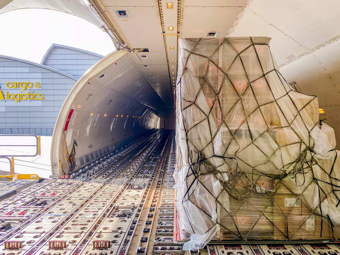 Once inside the aircraft, tracks are opened so that the pallets can be moved throughout the aircraft.