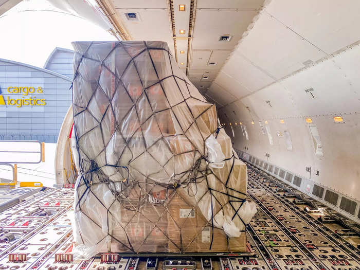 Each pallet can be stacked as high as three meters and boxes are stacked to match the curvature of the aircraft.