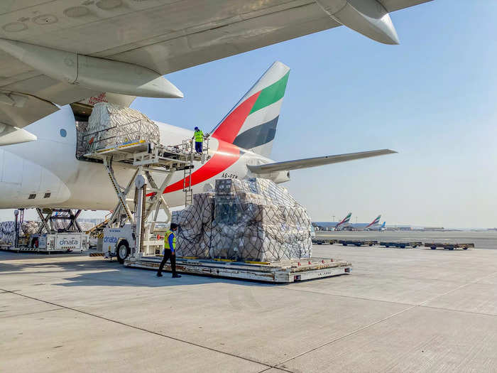 It takes around 30 seconds for cargo to be lowered from the upper deck to the tarmac, where it’s then pushed onto a dolly as part of a “dolly train.”