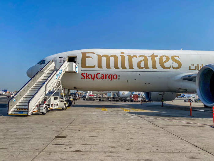 As soon as the aircraft pulled into its stand, a team of ground handlers descended on the plane just as they would if this was an Emirates passenger flight. Airstairs were brought to the front of the plane to allow the crew to deplane while cargo loaders focused on the rest of the aircraft.